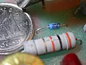 Component on circuit board from Ryobi Scroll Saw SC164VS. |  They control the timing (what phase angle) of the trigger to the triac. Maybe...
