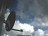 Somebody wanted a picture of my sat dish  |  I was actually looking at the clouds for the wind direction with the security...