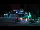 Fifth-year pixel display with mega tree, arches and full-house sync |  A lot of neighborhood displays stop at a few strings along the eaves. Ethan...
