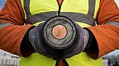 Power line time base |  I can't tell you when they started maintaining power frequency, but Google...