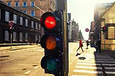 Two-light traffic signals |  It was common for a hanging flashing red (with flashing yellow on the cross...