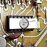 Chip ID |  Hi all,  Anyone seen one of these before? The IC itself has four bjts on a...