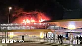 Luton Airport flights suspended after large car park fire |  I bet there were many BEVs in that garage.  . Reminds me of Stavanger Airport in...