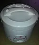 Rice cooker, opening  |  I have seen devices that require a thin tool inserted into the holes (please,...